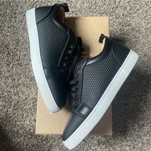 Christian Loubiton “Red Bottoms” Sneaker